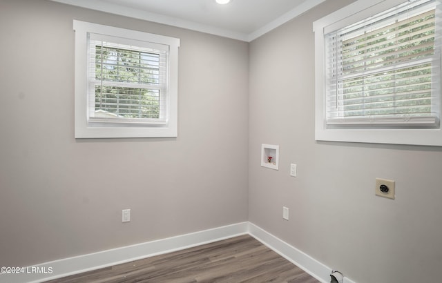 laundry area with hookup for a washing machine, ornamental molding, electric dryer hookup, and dark hardwood / wood-style floors