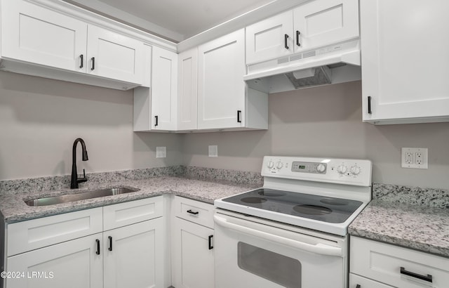 kitchen featuring white cabinetry, sink, and white electric range oven