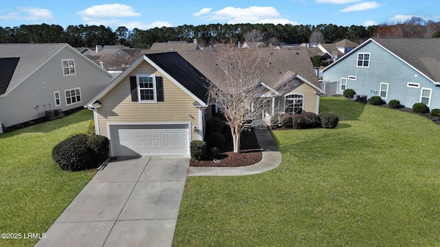 view of property featuring central AC unit, a garage, and a front lawn