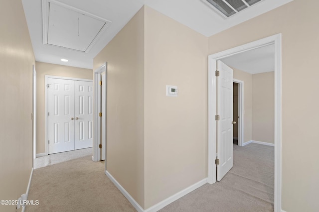 16 Maidencane St, Bluffton, SC 29910 - hallway featuring attic access, light carpet, and baseboards