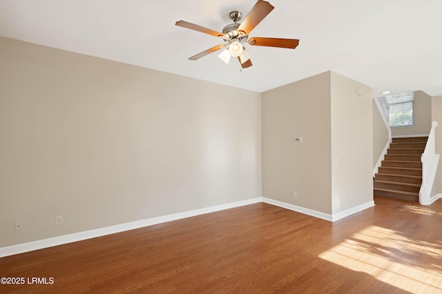 16 Maidencane St, Bluffton, SC 29910 - spare room featuring wood finished floors, ceiling fan, stairway, and baseboards