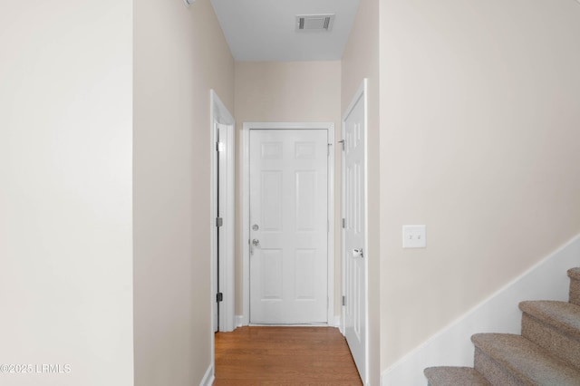 16 Maidencane St, Bluffton, SC 29910 - hall featuring wood finished floors, stairway, and baseboards