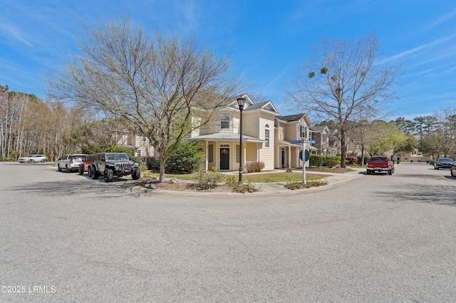 16 Maidencane St, Bluffton, SC 29910 - view of front of house featuring covered porch