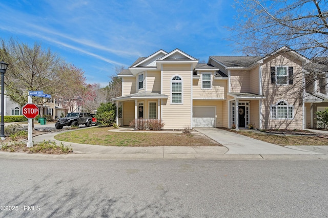 16 Maidencane St, Bluffton, SC 29910 - townhome / multi-family property featuring concrete driveway and a garage