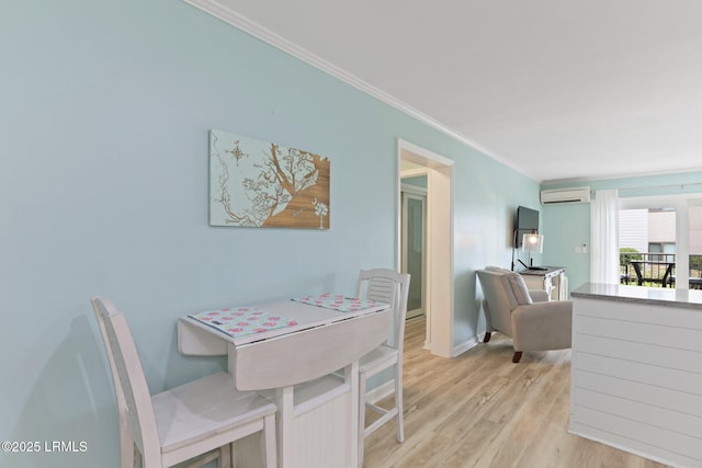15 S Forest Beach Dr Unit 1D, Hilton Head Island, SC 29928 - dining area featuring a wall mounted AC, wood finished floors, and ornamental molding