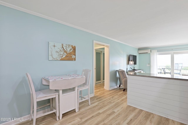 15 S Forest Beach Dr Unit 1D, Hilton Head Island, SC 29928 - dining area featuring a wall mounted air conditioner, ornamental molding, wood finished floors, baseboards, and an office area