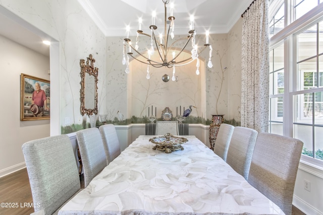 71 Peninsula Dr, Hilton Head Island, SC 29926 - dining room with ornamental molding, a chandelier, and dark wood-style floors