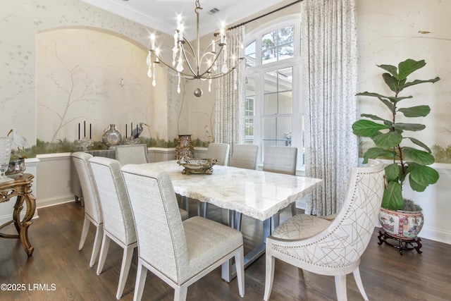 71 Peninsula Dr, Hilton Head Island, SC 29926 - dining space featuring dark wood finished floors, a chandelier, and ornamental molding