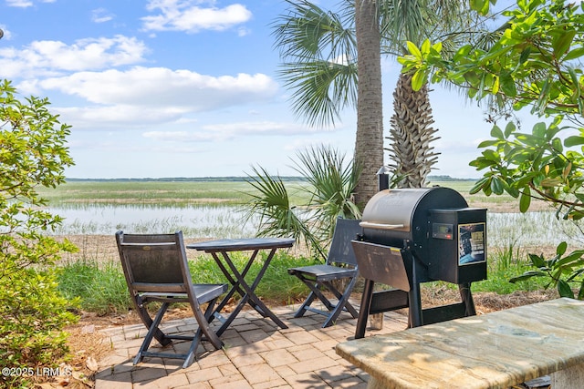 71 Peninsula Dr, Hilton Head Island, SC 29926 - view of patio with area for grilling and a water view