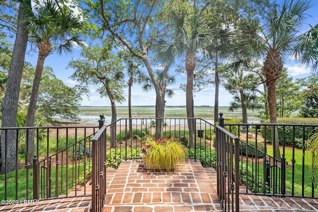 71 Peninsula Dr, Hilton Head Island, SC 29926 - view of patio / terrace with a water view and stairs