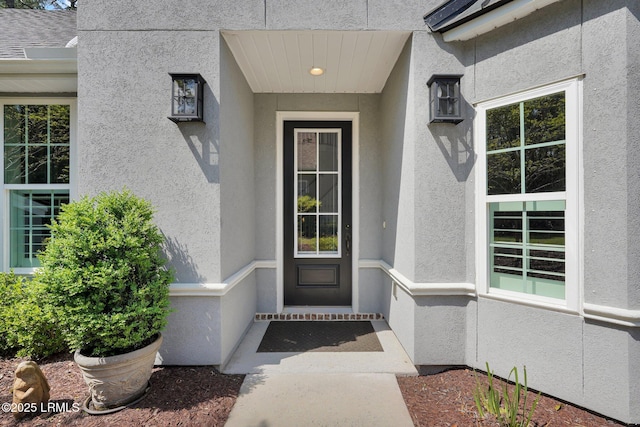 33 Paxton Cir, Bluffton, SC 29910 - view of exterior entry featuring stucco siding