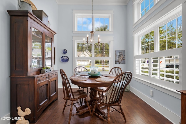 33 Paxton Cir, Bluffton, SC 29910 - dining space featuring a wealth of natural light, dark wood-style floors, an inviting chandelier, and ornamental molding