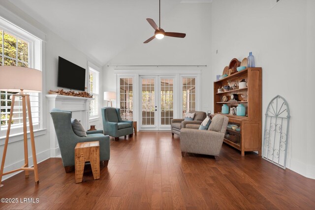 33 Paxton Cir, Bluffton, SC 29910 - living area with high vaulted ceiling, a fireplace, a ceiling fan, wood finished floors, and french doors