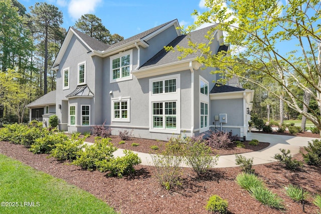 33 Paxton Cir, Bluffton, SC 29910 - exterior space with driveway, stucco siding, and a shingled roof