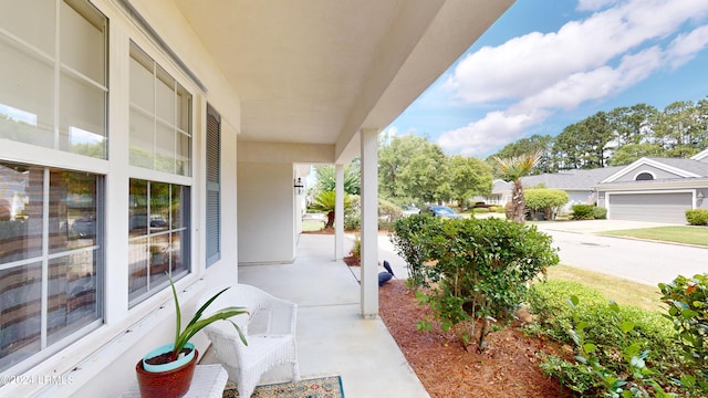 view of patio featuring a porch