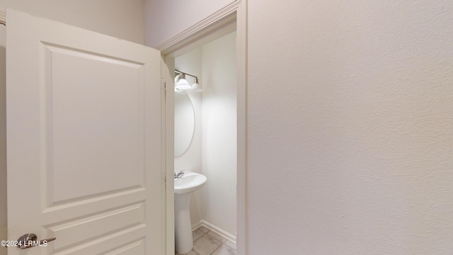 bathroom with tile patterned flooring