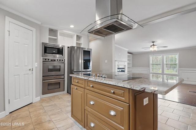 41 Able St, Bluffton, SC 29910 - kitchen with appliances with stainless steel finishes, island range hood, crown molding, open shelves, and light tile patterned flooring