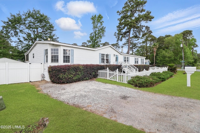 41 Able St, Bluffton, SC 29910 - manufactured / mobile home featuring a gate