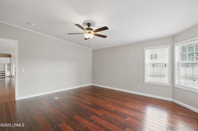 41 Able St, Bluffton, SC 29910 - spare room featuring a ceiling fan, dark wood-style flooring, and baseboards