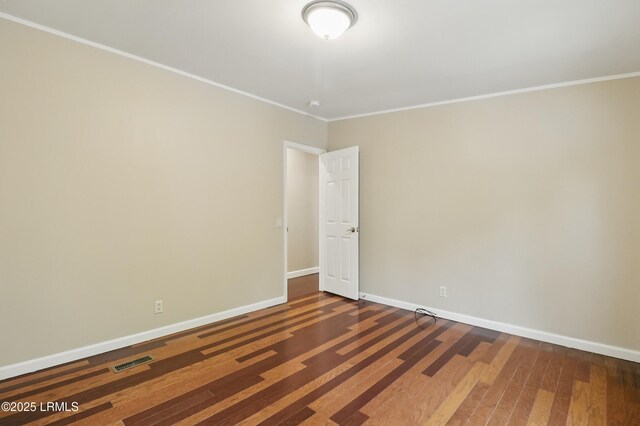 41 Able St, Bluffton, SC 29910 - spare room with ornamental molding, baseboards, and wood finished floors