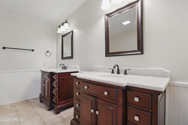 41 Able St, Bluffton, SC 29910 - bathroom with a wainscoted wall, two vanities, and tile patterned floors
