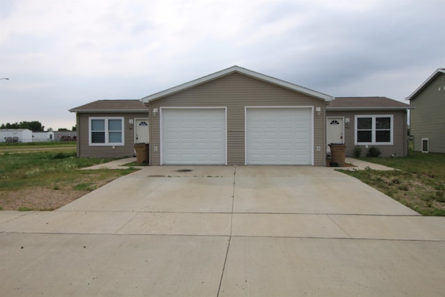 ranch-style house featuring a garage