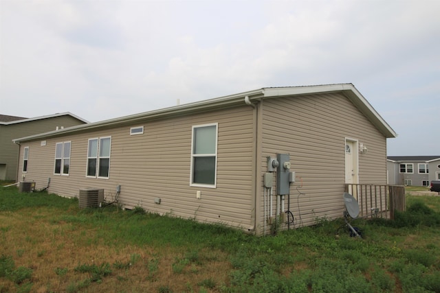 view of property exterior with central AC unit