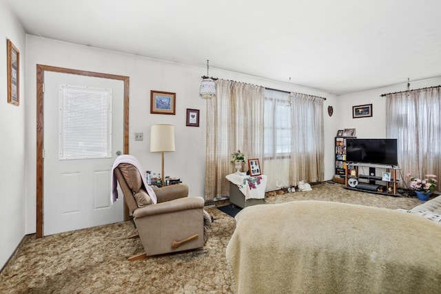 bedroom with light carpet