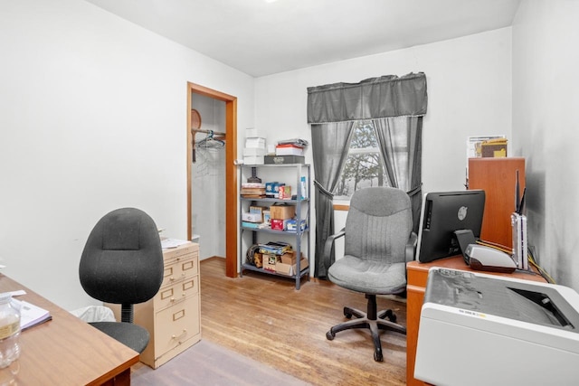 home office featuring light hardwood / wood-style floors