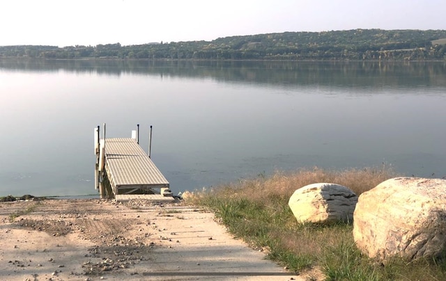 view of dock with a water view