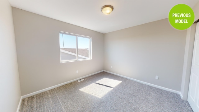 empty room featuring carpet