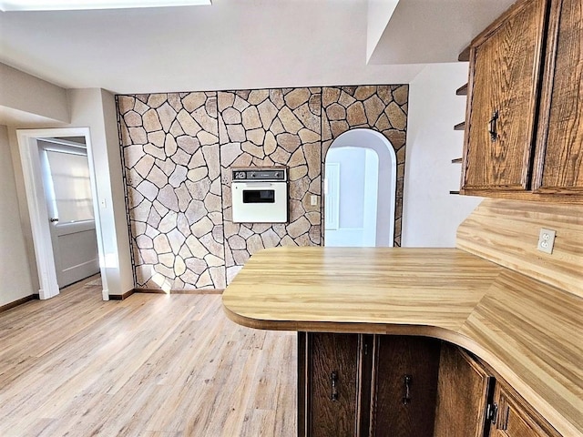 810 2nd Ave, Kenmare, ND 58746 - interior space with light wood-type flooring and white oven