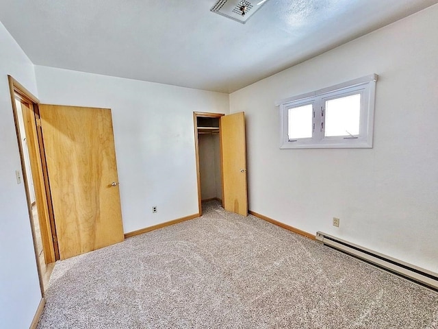 810 2nd Ave, Kenmare, ND 58746 - unfurnished bedroom with light carpet and baseboard heating