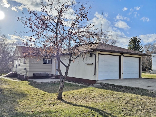 810 2nd Ave, Kenmare, ND 58746 - view of property exterior with a yard and a garage