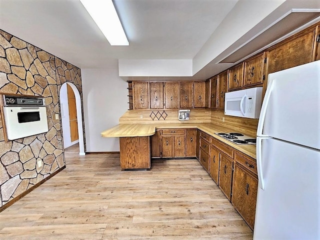 810 2nd Ave, Kenmare, ND 58746 - kitchen featuring light hardwood / wood-style flooring and white appliances