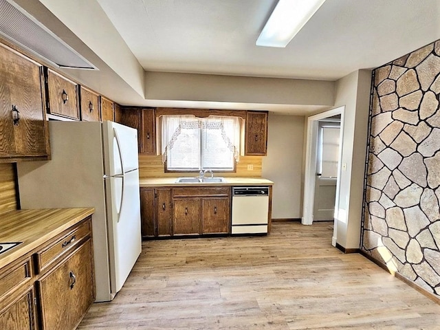 810 2nd Ave, Kenmare, ND 58746 - kitchen featuring backsplash, white appliances, sink, and light wood-type flooring
