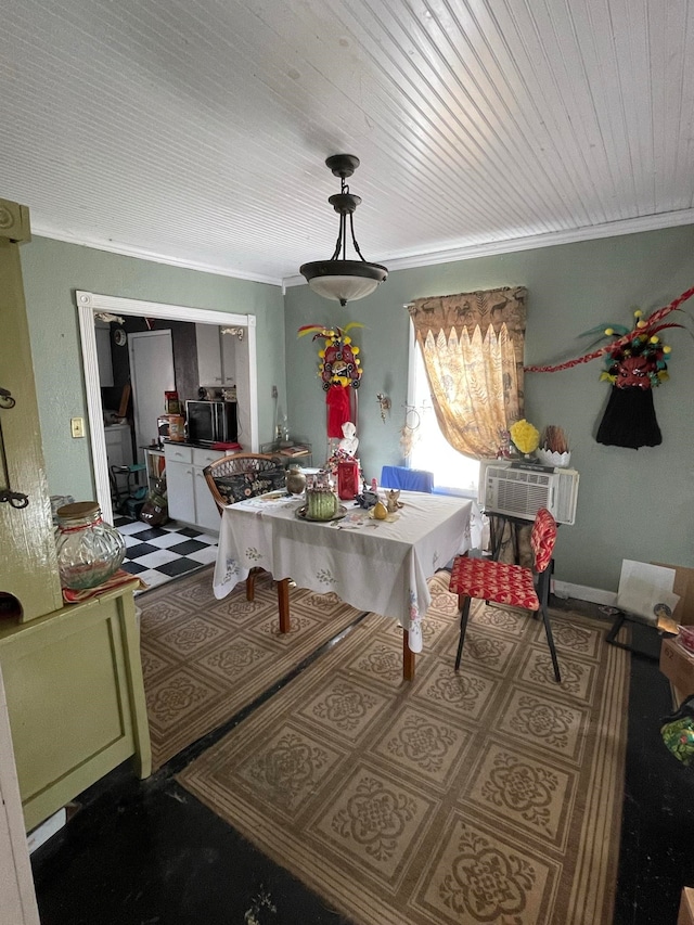 tiled dining room with ornamental molding and an AC wall unit