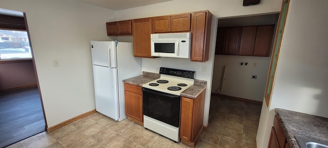 kitchen featuring white appliances