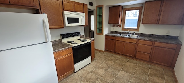 kitchen featuring sink and white appliances