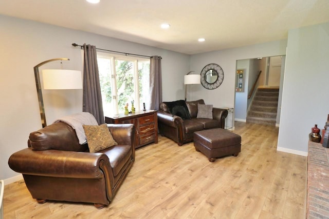 living room with light hardwood / wood-style flooring