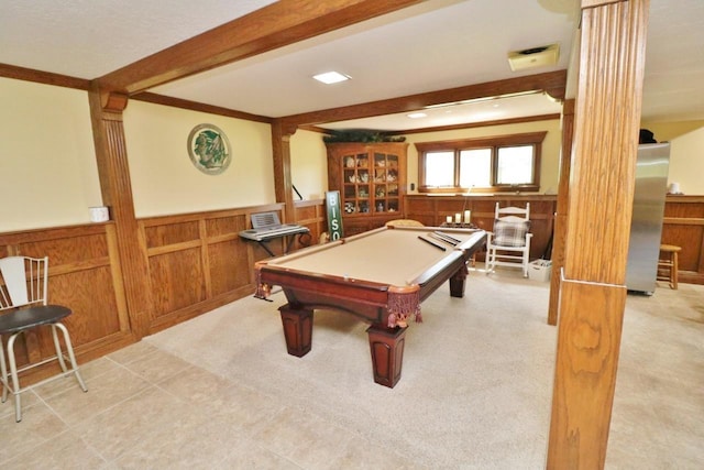 recreation room featuring wooden walls, beam ceiling, light colored carpet, and pool table