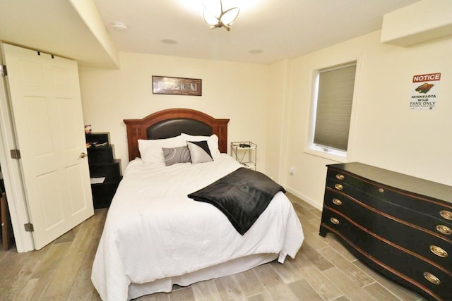 bedroom featuring light hardwood / wood-style flooring