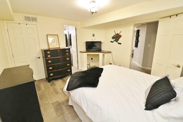 bedroom featuring light hardwood / wood-style floors