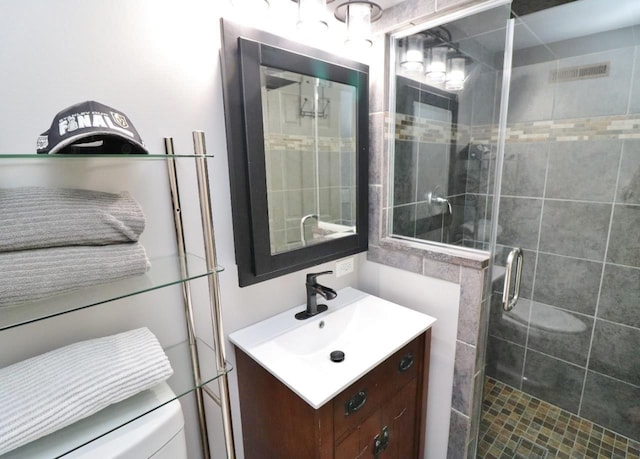 bathroom with vanity and walk in shower