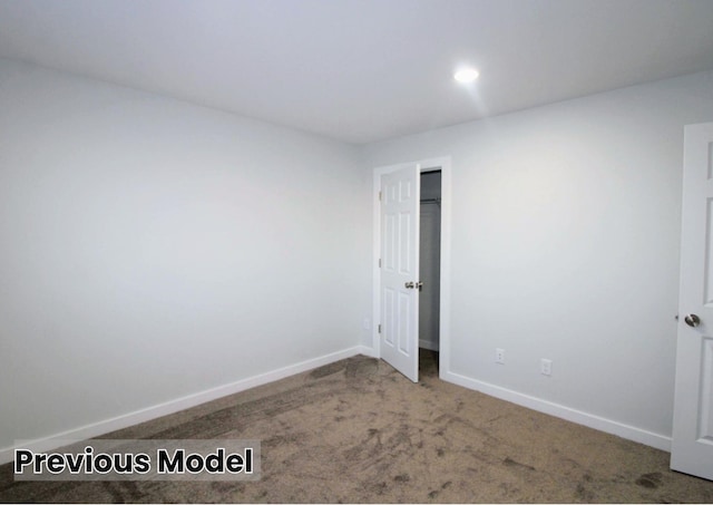 unfurnished room with carpet