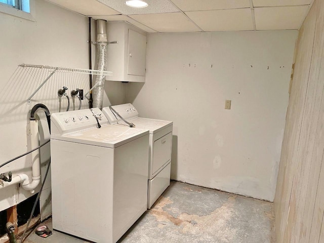 washroom featuring washing machine and clothes dryer