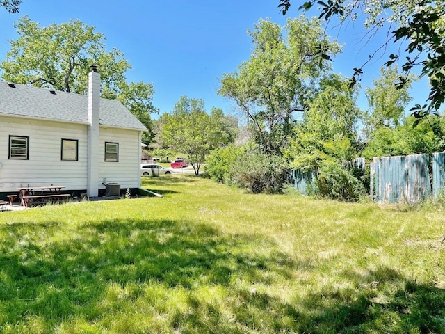 view of yard with central AC