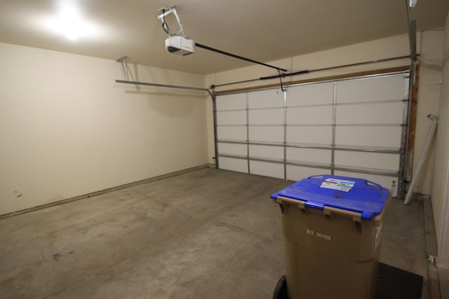 garage featuring a garage door opener