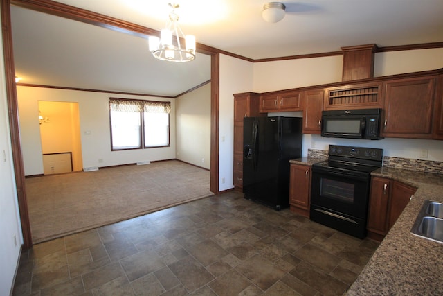 kitchen featuring dark carpet, an inviting chandelier, black appliances, sink, and decorative light fixtures