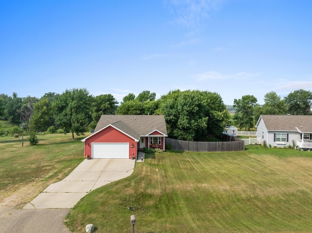 ranch-style house with an outdoor structure, a garage, and a front lawn